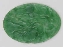 A Chinese green jade plaque