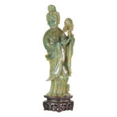 A CHINESE GREEN JADEITE FIGURE