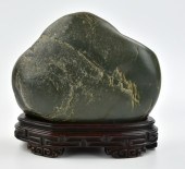 A CHINESE GREEN JADEITE SHANZI