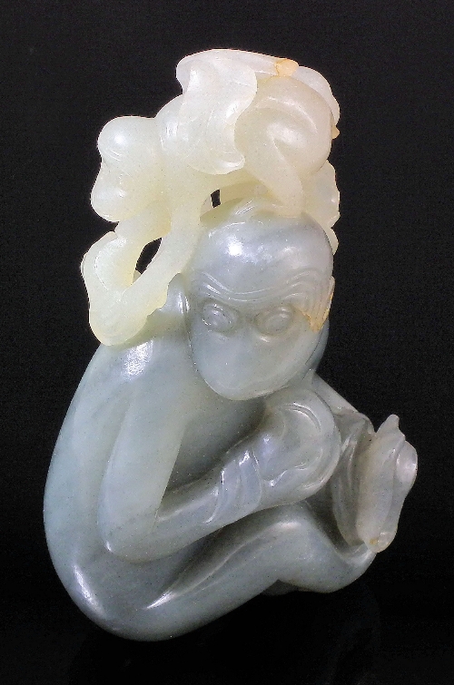 A Chinese grey and celadon jade