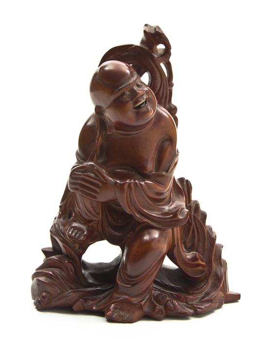 A Chinese Hardwood Carving of a