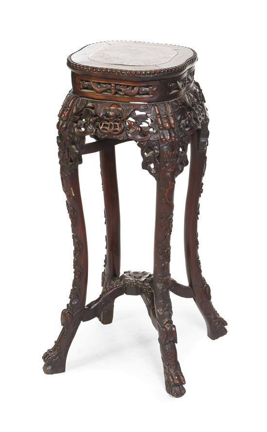 A Chinese Hardwood Stand having a
