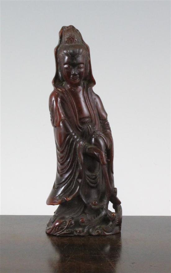 A Chinese horn standing figure of