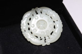 A CHINESE HOTAN-CURVING JADE F