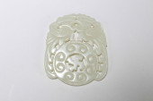 A CHINESE HOTAN-CURVING JADE F