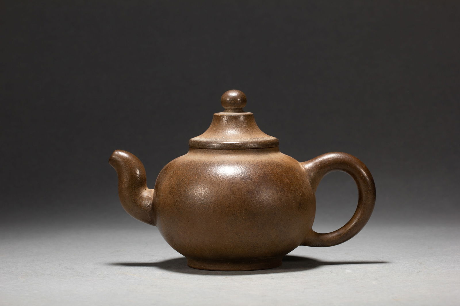 A CHINESE INSCRIBED YIXING GLAZE