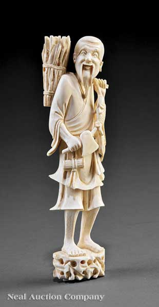 A Chinese Ivory Figure of a