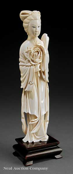 A Chinese Ivory Figure of a