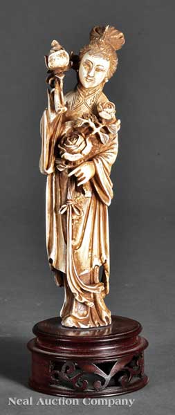 A Chinese Ivory Figure of a