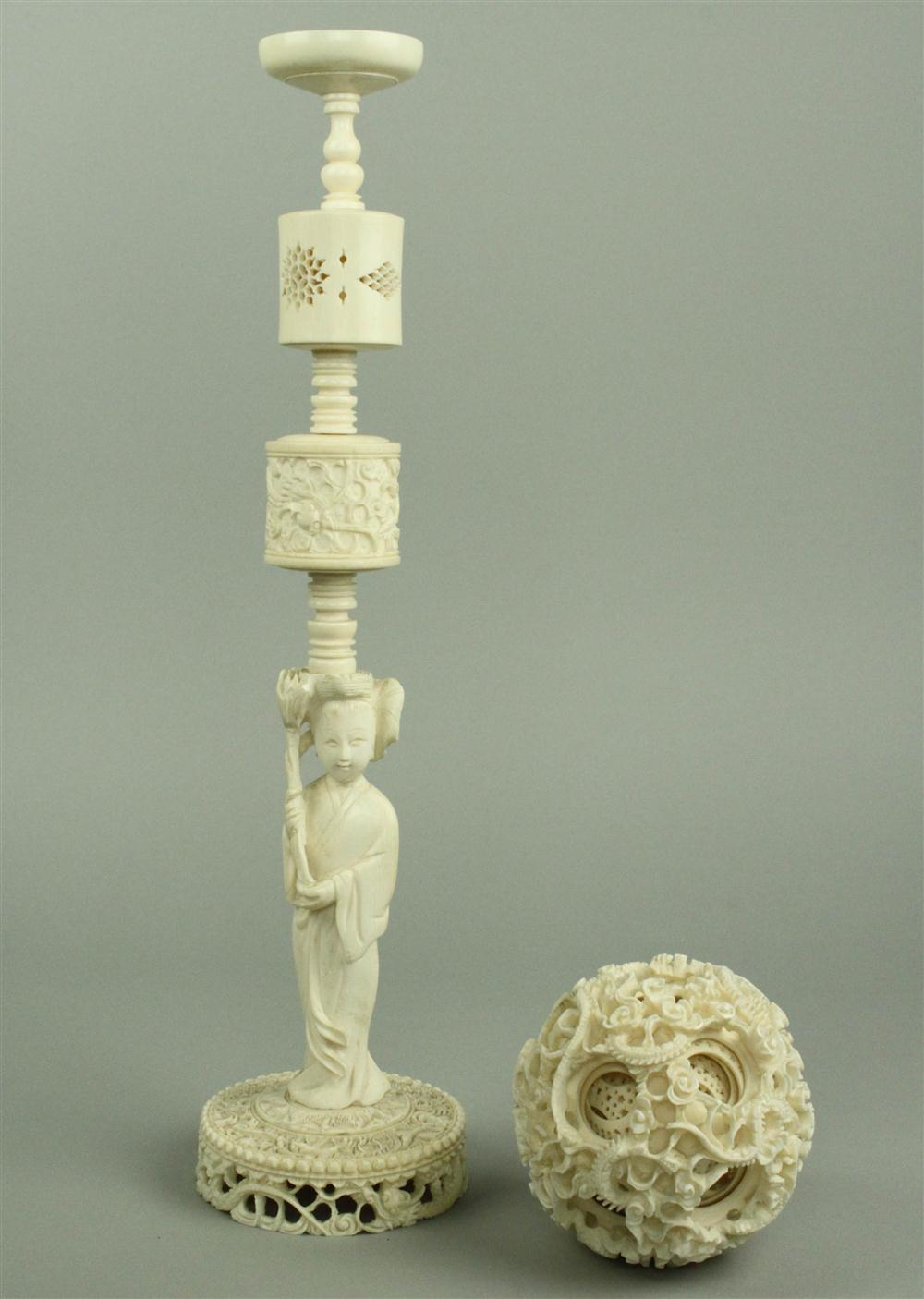 A CHINESE IVORY PUZZLE BALL ON