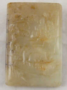 A Chinese jade pendant carved in