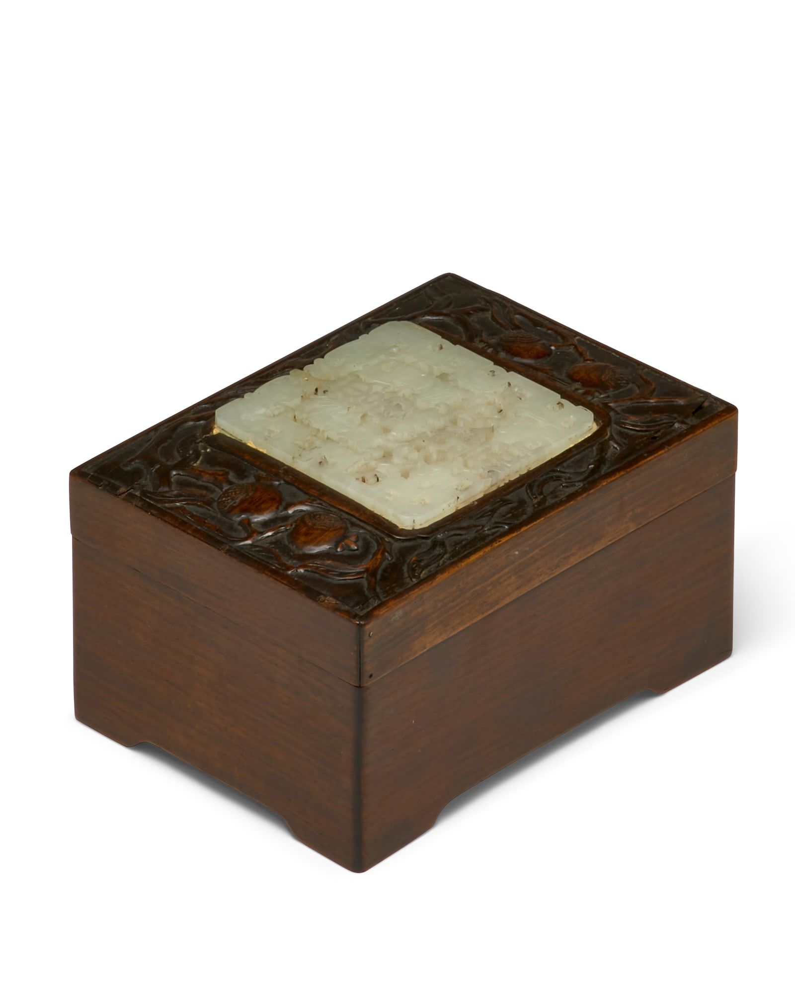 A CHINESE JADE PLAQUE MOUNTED ON