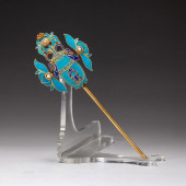 A CHINESE KING FISHER FEATHER