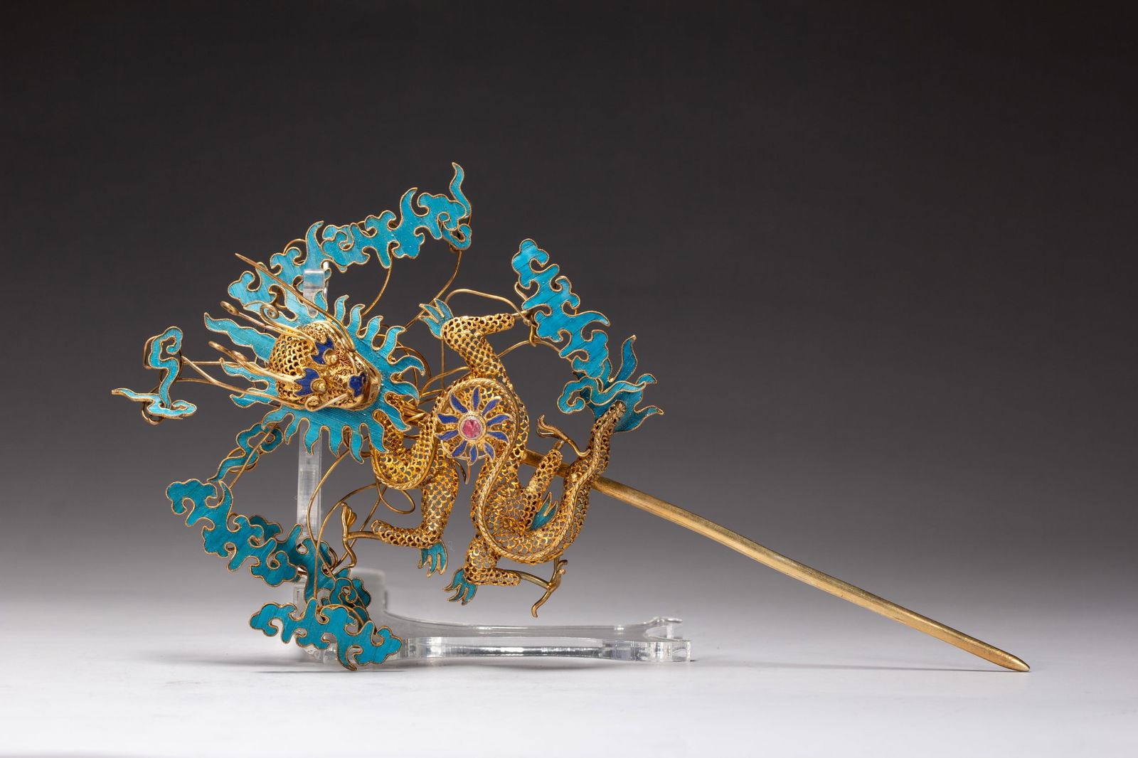 A CHINESE KING FISHER FEATHER