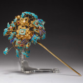 A CHINESE KING FISHER FEATHER