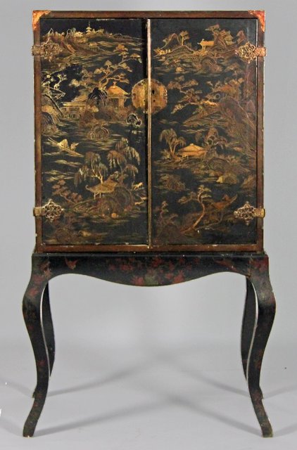 A Chinese lacquer cabinet on