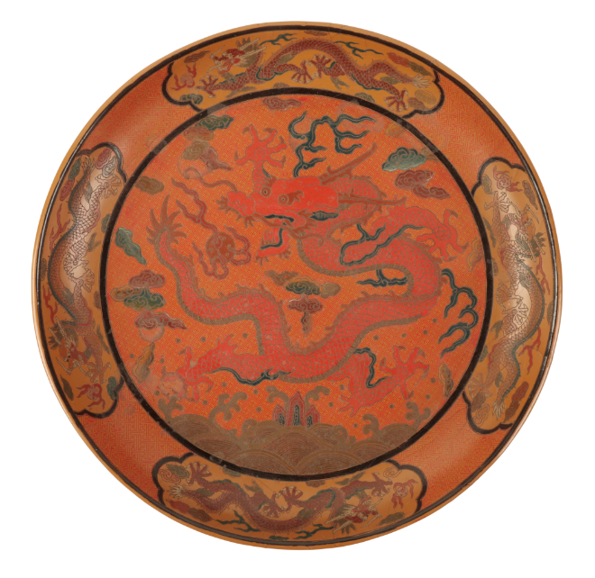 A CHINESE LACQUER DISH decorated in
