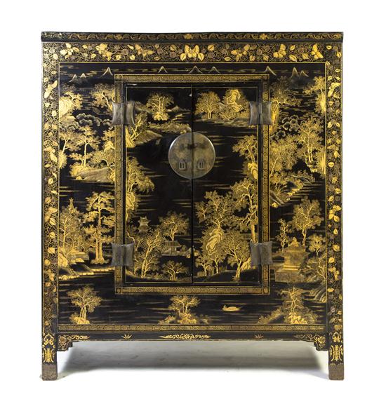 A Chinese Lacquered Cabinet of