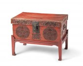 A CHINESE LEATHER CHEST ON A W