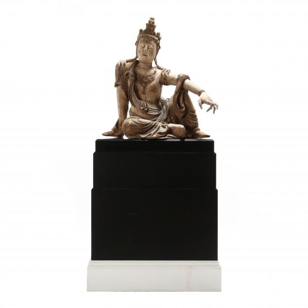 A CHINESE LIFESIZE SEATED CARVED