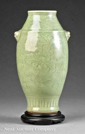 A Chinese Longquan Celadon Por