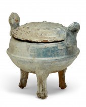 A CHINESE LUSTER GLAZED COVERE