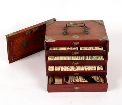 A Chinese Mah Jong set in a metal