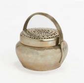 A CHINESE METAL ALLOY HAND WAR