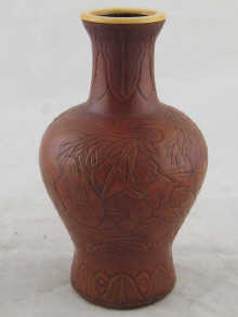 A Chinese moulded gourd vase with
