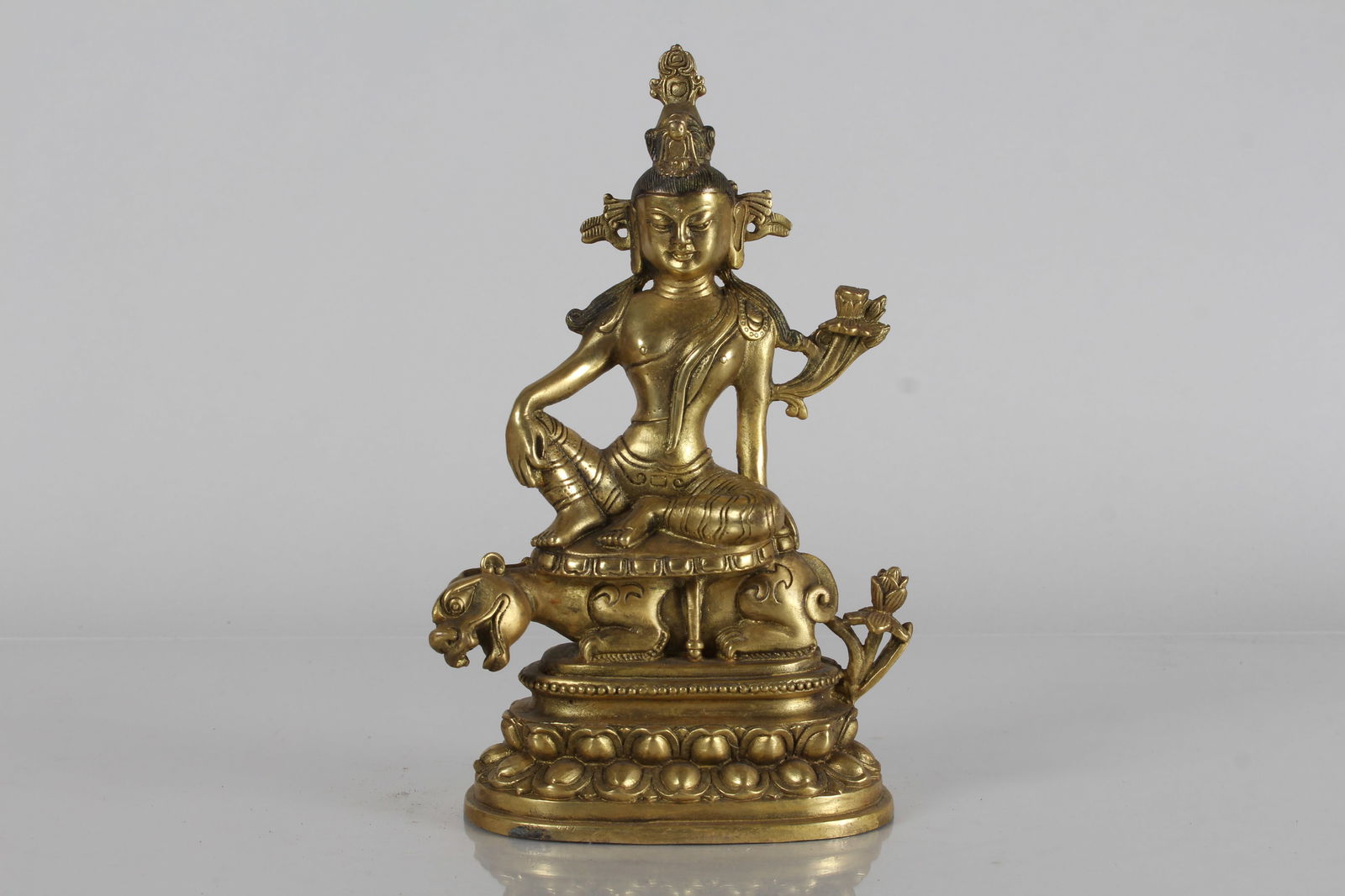 A CHINESE MYTH-BEAST GILT FORTUNE