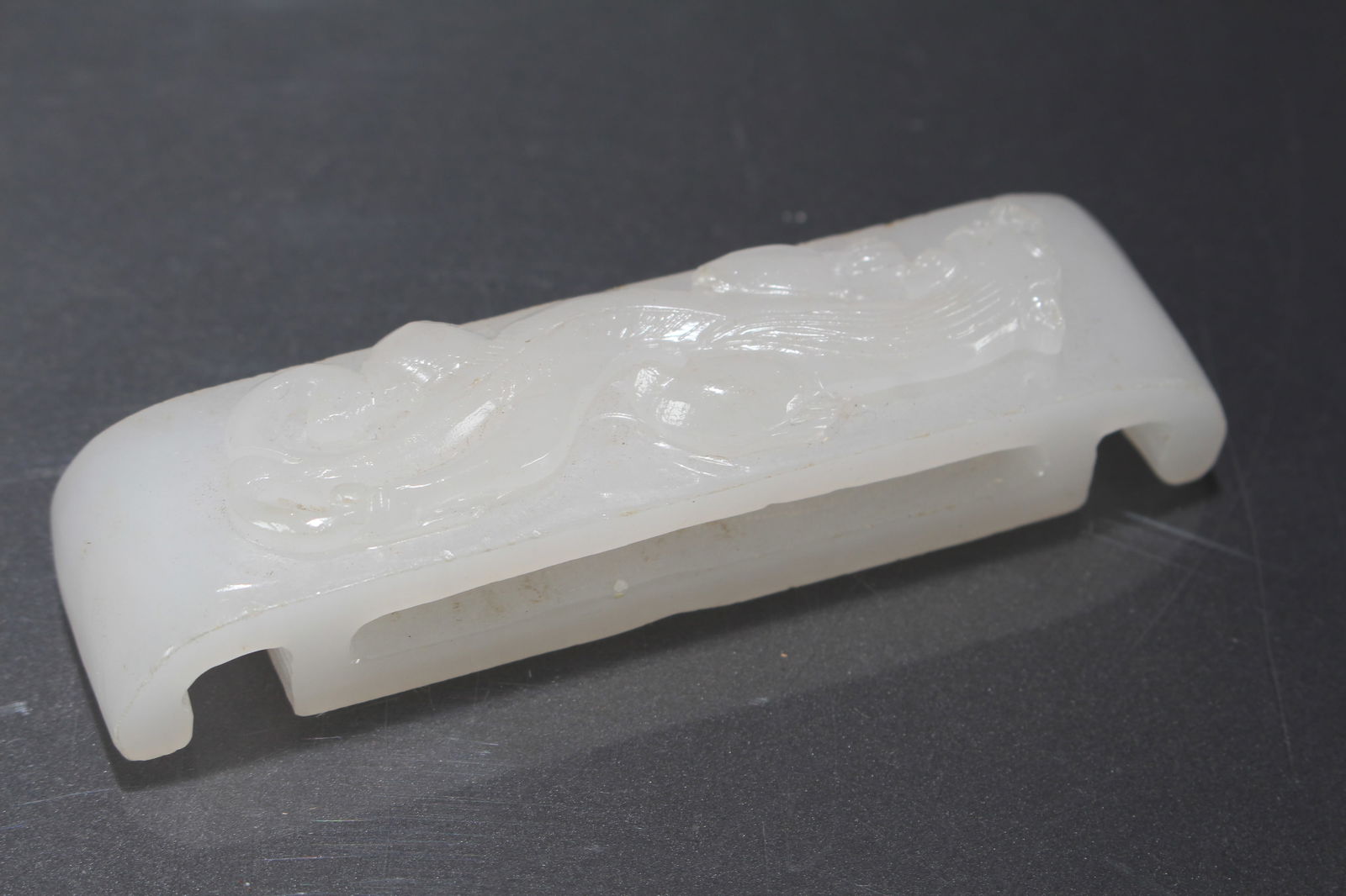 A CHINESE MYTH-BEAST JADE FIGUREA