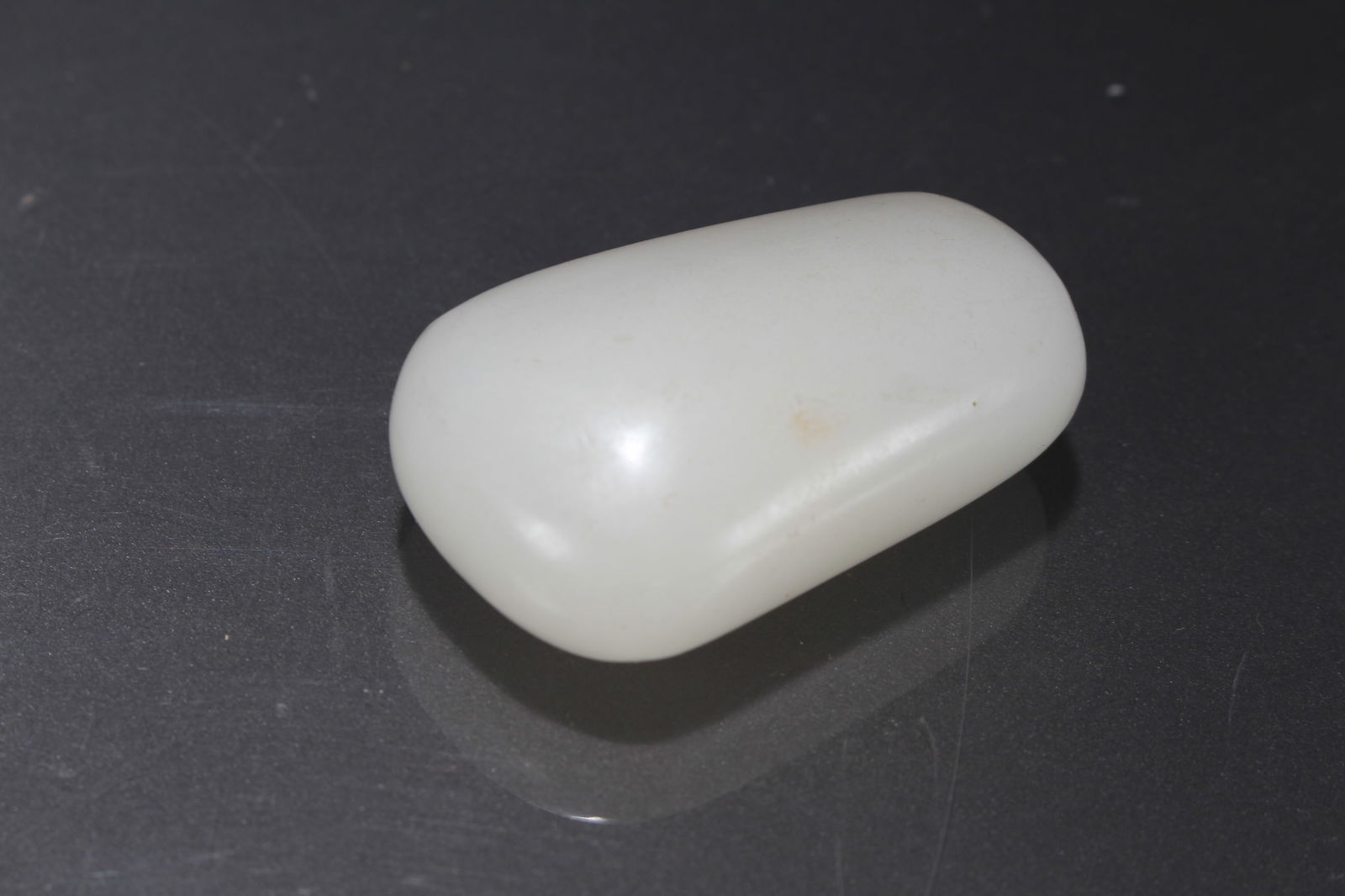 A CHINESE MYTH-BEAST JADE FIGUREA