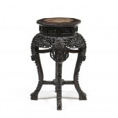 A CHINESE OCTAGONAL CARVED CHI