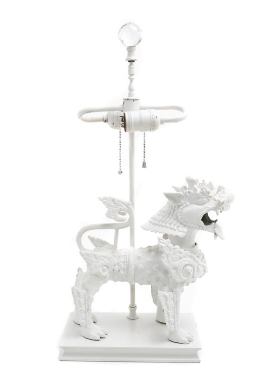 A Chinese Painted Iron Fu Dog