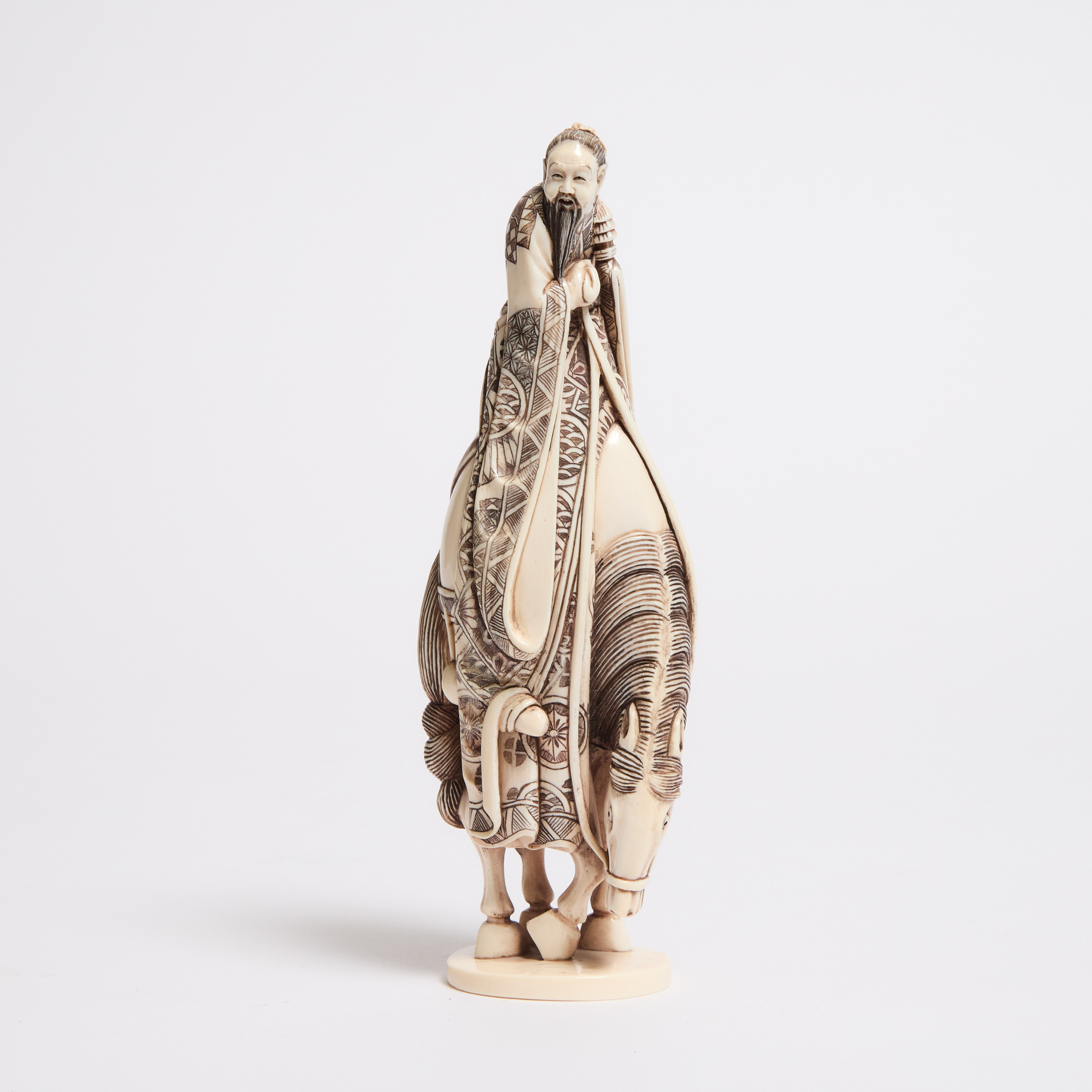 A Chinese Painted Ivory Carving