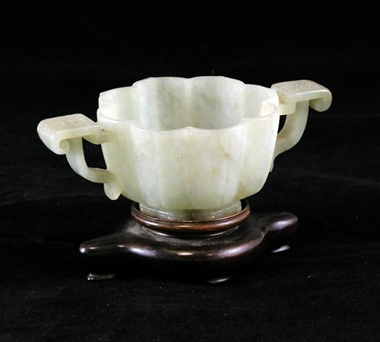 A Chinese pale celadon jade petal