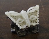 A Chinese pale celadon jade bu
