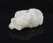 A Chinese pale celadon jade sc