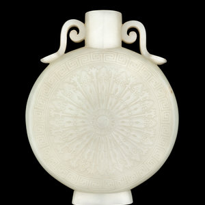 A Chinese Pale Celadon Jade Moon