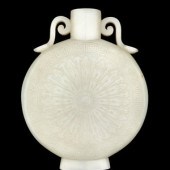 A Chinese Pale Celadon Jade Mo