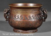 A Chinese Patinated Bronze Cen