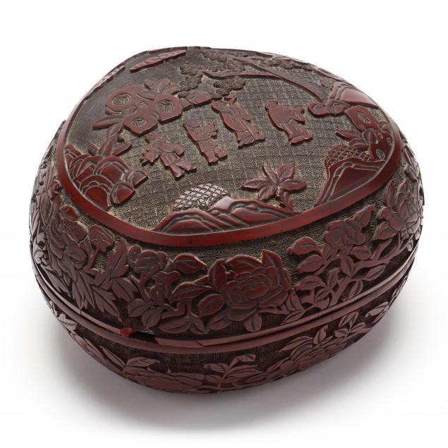 A CHINESE PEACH SHAPED CARVED
