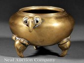 A Chinese Polished Bronze Trip