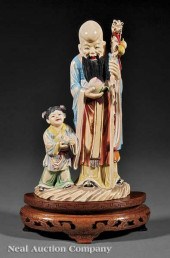 A Chinese Polychromed Ivory Fi