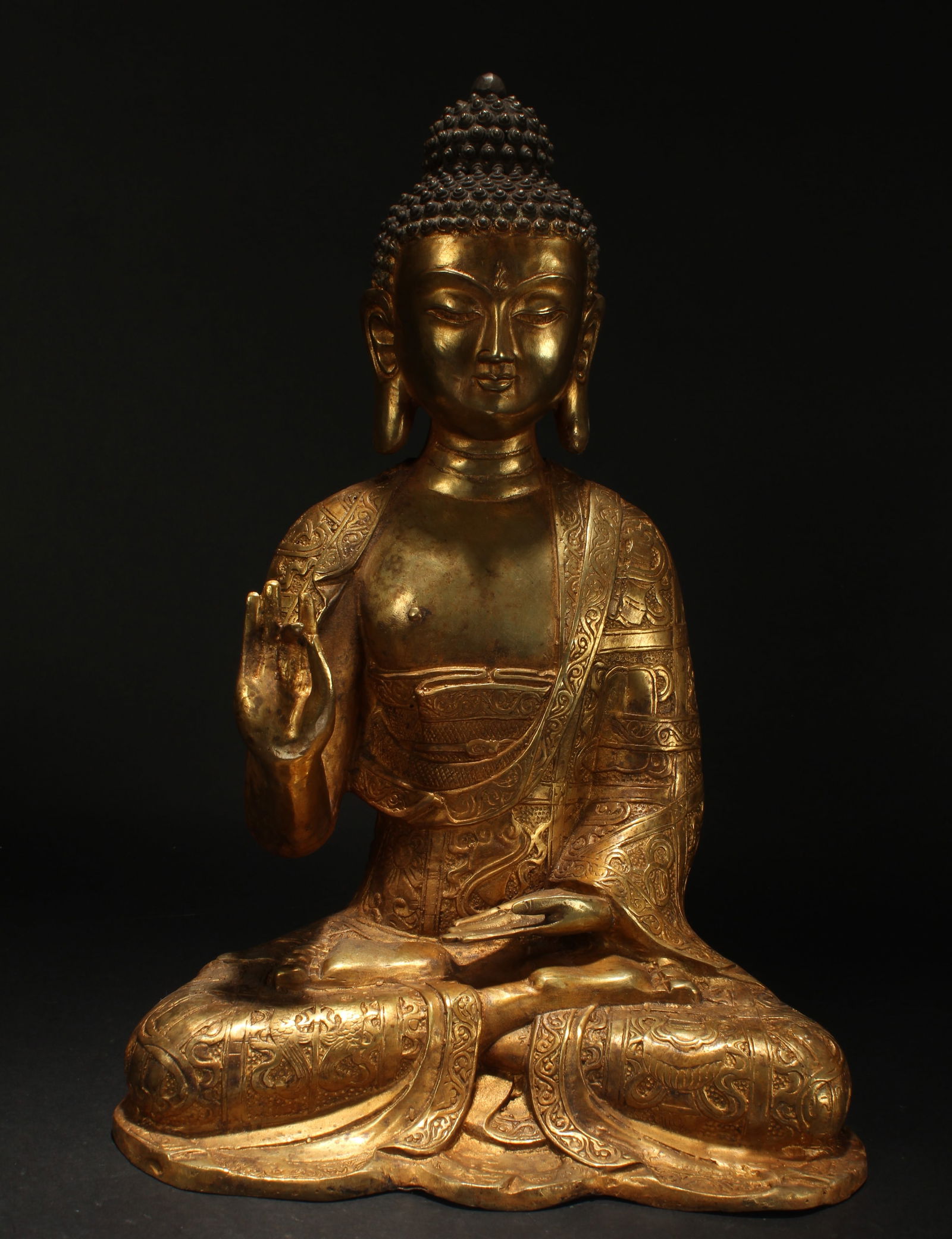A CHINESE PONDERING-POSE  GILT
