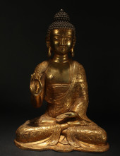 A CHINESE PONDERING-POSE  GILT
