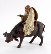 A Chinese pottery figure by Li