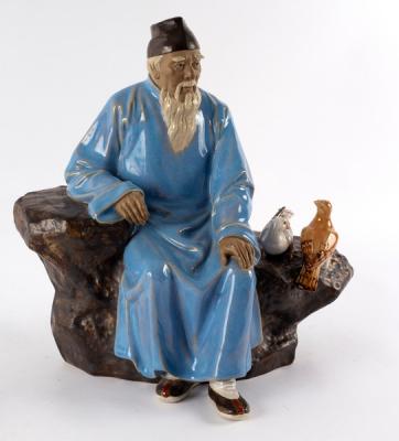 A Chinese pottery figure by Liu