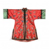 A CHINESE RED SILK EMBROIDERED