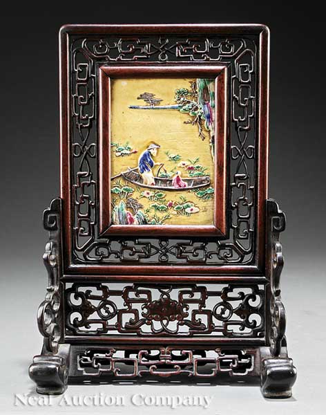 A Chinese Relief Molded Famille
